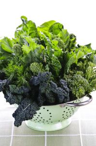 Dark green leafy vegetables in colander